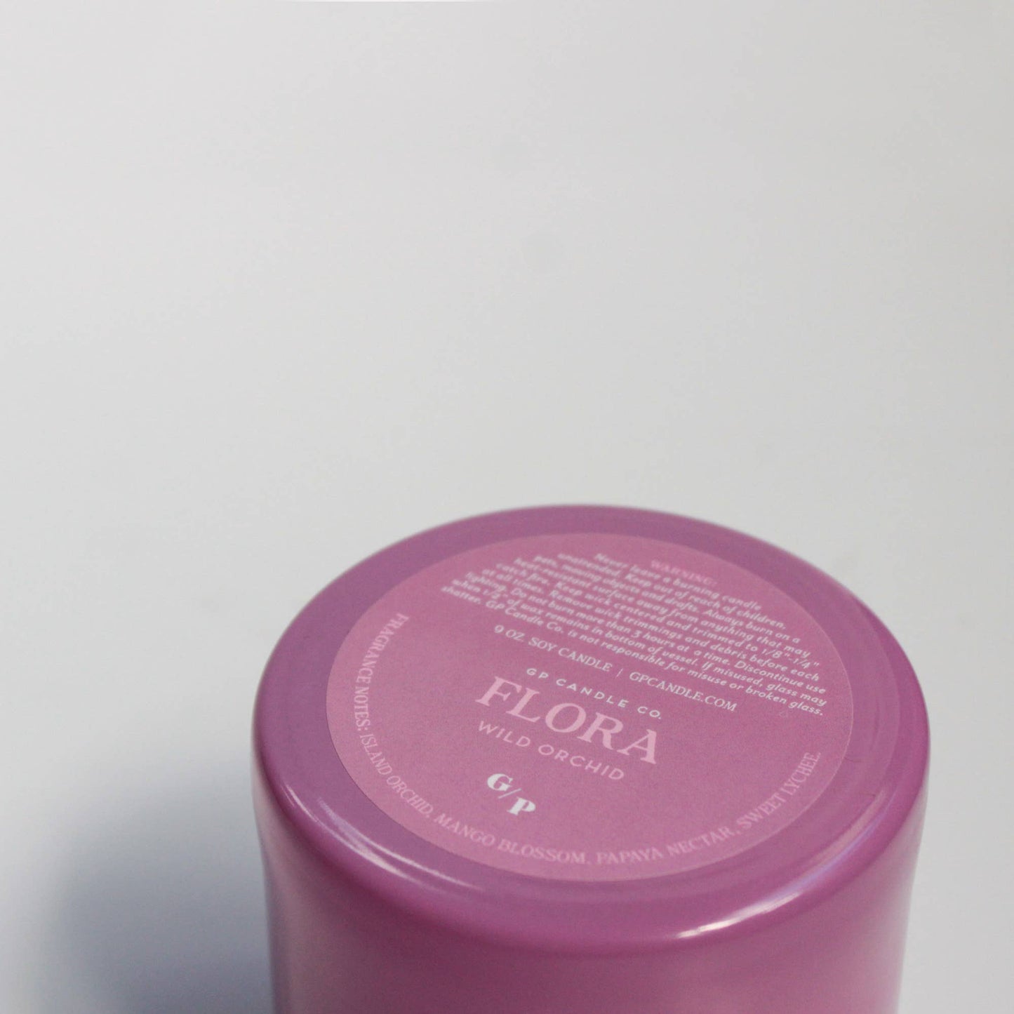 Flora 9 oz. Hue Candle (Wild Orchid)
