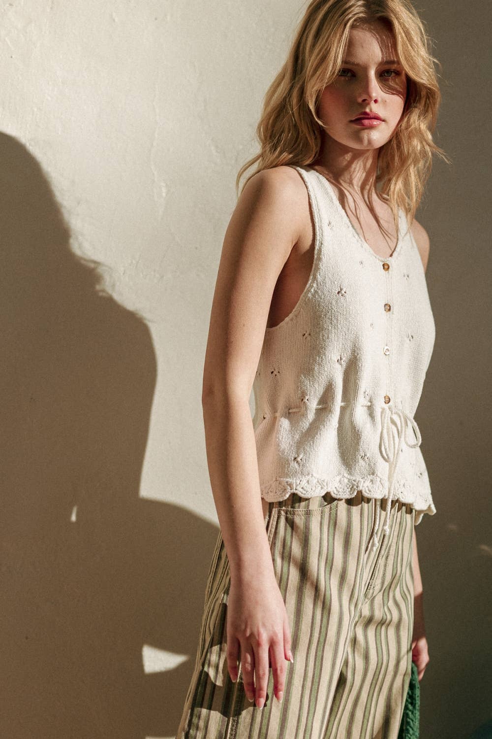 SLEEVELESS BUTTON KNIT TOP