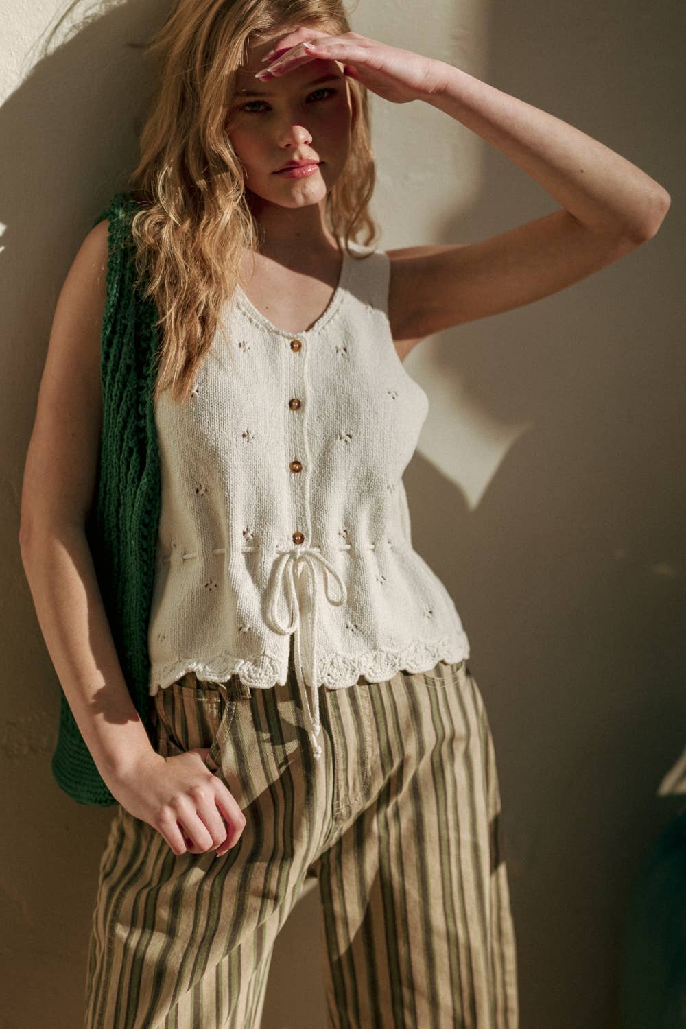SLEEVELESS BUTTON KNIT TOP